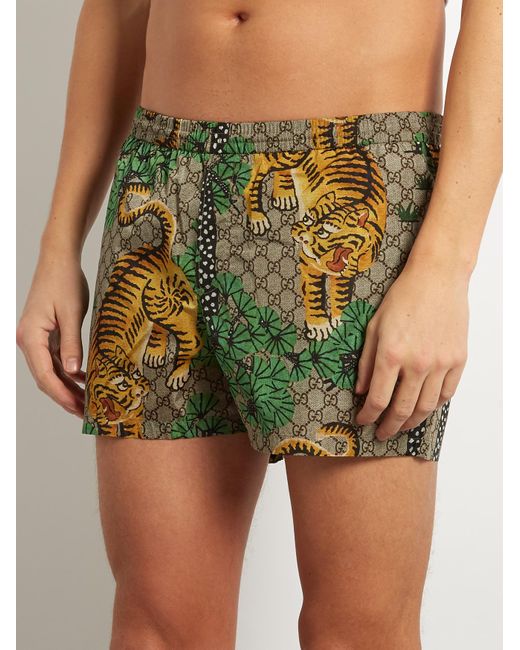 Gucci store tiger shorts
